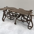 Artistic Wooden Dining Table With Intricate Curved Legs And Unique Structure Design