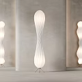 Modern Floor Lamp With Twisted Design And Sleek Lines In Light Interior Space