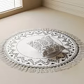 Black And White Round Carpet With Geometric Patterns Fringed Edges And Decorative Pillow