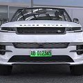 White SUV With Black Roof Black Wheels And Modern Exterior Design