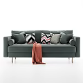 Modern Green Multi Person Sofa Featuring Patterned Pillows And Orange Throw Blanket 3d model