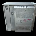White Metal Utility Box With Graffiti Locks And 205 FR Numbering
