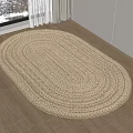 Oval Braided Light Colored Area Rug On Wooden Floor Near Window