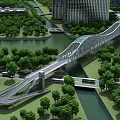 Modern Arch Bridge With Roadway And Railings Near Modern Buildings Trees And River