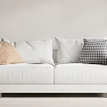 White Upholstered Two Seater Sofa With Beige Plain White And Houndstooth Pattern Cushions