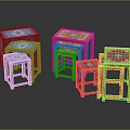 Colorful Patterned Stools in Blue Yellow Red Stacked for Home Decor