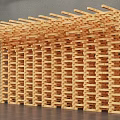 Modern Layered Wooden Structure With Stacked Geometric Beams Art Design