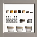 Kitchen Cabinet Storage With Various Colored Spice Jars Transparent Bottles Plates And Lidded Containers