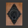 Black Metal Door Knocker With Lion Head Design On Wooden Background And Intricate Carvings