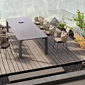 Wooden Deck With Long Table Wicker Chairs Green Plants Flowers And Glass Railing