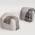 Beige and Gray Upholstered Ottomans With Soft Blanket and Plaid Throw 3d model
