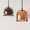 Modern Pendant Lights With Dark Brown And Orange Glass Shades And Metal Frames