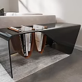Modern Black Glass Side Table With Books And Decor Near Sofa Living Room