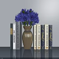 Golden Vase With Purple Flowers And Art Architecture Books On Gray Modern Tabletop