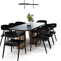 Modern Dining Table Set With Black Chairs Wooden Table And Green Plant