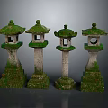 Moss Covered Traditional Japanese Stone Lanterns With Stone Bases And Classic Design