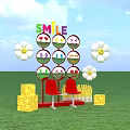 Vibrant Photo Spot With SMILE Sign Smiley Faces White Flowers Red Chairs And Green Grass