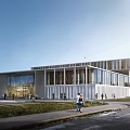 Modern Sports Stadium Building With Glass Facade Large Windows Lawn And Pedestrians