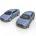 Two Blue Cars With One Featuring Cracked Windshield And Smooth Exterior Design