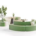 Green Curved Banquette Sofa With Round Tables And Potted Plants In Living Space