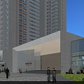 Modern Entrance Gate of High Rise Building with Glass Curtain Wall Steps and Greenery