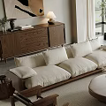Modern Living Room With Beige Sofas Round Coffee Table And Wooden Furniture
