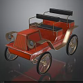 Vintage Red Open Top Car With Black Seats And Brass Wheels