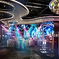 MOII Bar Interior With Black Brick Walls White Sculptures And Wavy Ceiling