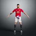 Man in Red Manchester United Jersey Standing with Soccer Ball and Arms Outstretched on Gray Background
