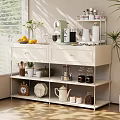 Modern White Sideboard Featuring Coffee Machine Fruits Green Plants and Storage Shelves in Sunlit Room