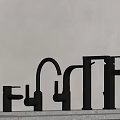 Sleek Black Faucets With Different Shapes And Modern Designs On Countertop
