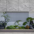 Indoor Landscape With Wavy Textured Wall Grid Patterned Backdrop Green Plants And Stones