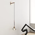 Modern Minimalist Wall Lamp With Brass Accent And Glass Shade For Interior Lighting