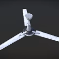 White Three Blades Ceiling Air Conditioner Fan Mounted Against Dark Background