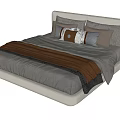 Modern Double Bed With Upholstered Headboard Gray Bedding Brown Throw And Decorative Pillows