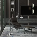 Dark Brown Leather Lounge Chair With Metal Frame In Modern Living Room With TV Shelves