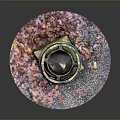 Vintage Ornamental Tower Structure With Rusted Surface Green Moss And Colorful Gravel Base
