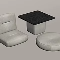 Light Colored Fabric Chair with Square Black Top Table and Round Pouf Set