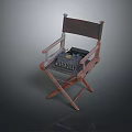 Vintage Wooden Director's Chair With Classic Typewriter Resting On Seat Surface