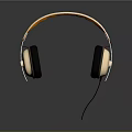 Over Ear Wired Headphones With Light Brown Headband And Black Earpads