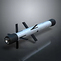 Military Missile With Silver Cylindrical Body Black Stabilizing Fins And Front Warhead