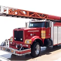 Red and White Fire Truck with Extended Ladder for Emergency Rescue Operations