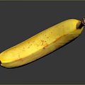 Fresh Yellow Banana with Brown Spots on Black Background and Clear Reflection