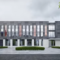 Modern Office Building With Gray Red Facade Large Windows And Front Landscaping 3d model
