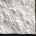White Rough Textured Background Wall With Wooden Panels And Framed Artwork