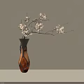 Brown and Black Vase with Wooden Texture Holding White Flowering Branches in Minimalist Setting