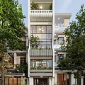 Modern Detached Villa With Multi Story Design Large Glass Windows Greenery Balconies And Surrounding Trees