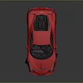 Red Luxury Sports Car With Streamlined Design And Black Alloy Wheels