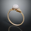 Elegant Golden Ring With White Pearl And Diamond Accents Design