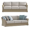 Modern Three Seater Wicker Sofa With Beige Fabric Seats And Blue Cushions